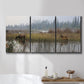 Three-panel canvas wall art featuring wildlife walking through open field, displayed in a bathroom above a bathtub.