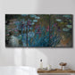 Three-panel canvas wall art featuring water lilies on reflective pond, displayed in a bathroom above a bathtub.