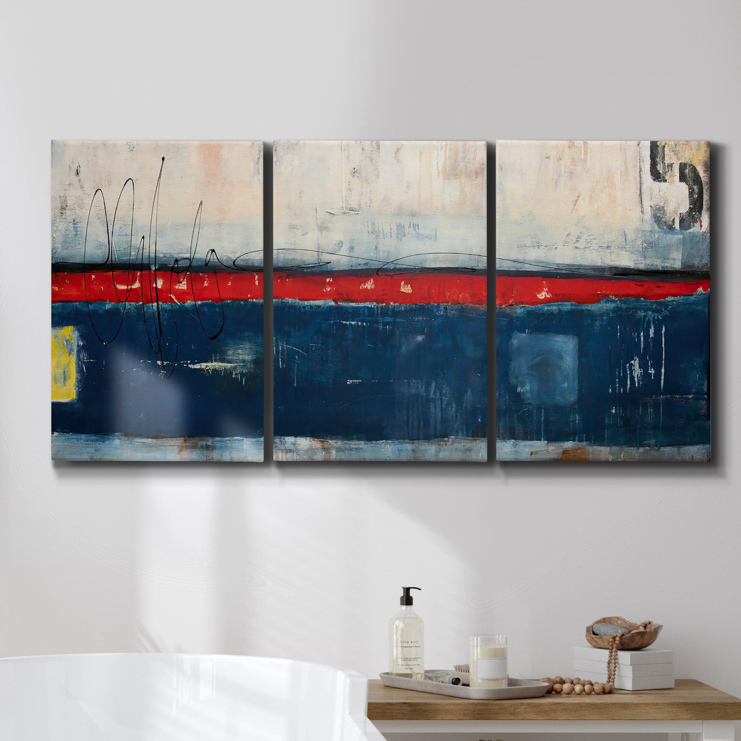 Three-panel canvas wall art featuring weathered coastal dock scene, displayed in a bathroom above a bathtub.
