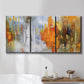 Three-panel canvas wall art featuring abstract warm sunset tones, displayed in a bathroom above a bathtub.