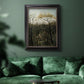 Dreamlike forest landscape scene by Henri Rousseau in an ornate black frame with gilded inner detail displayed in a dark-toned interior setting.