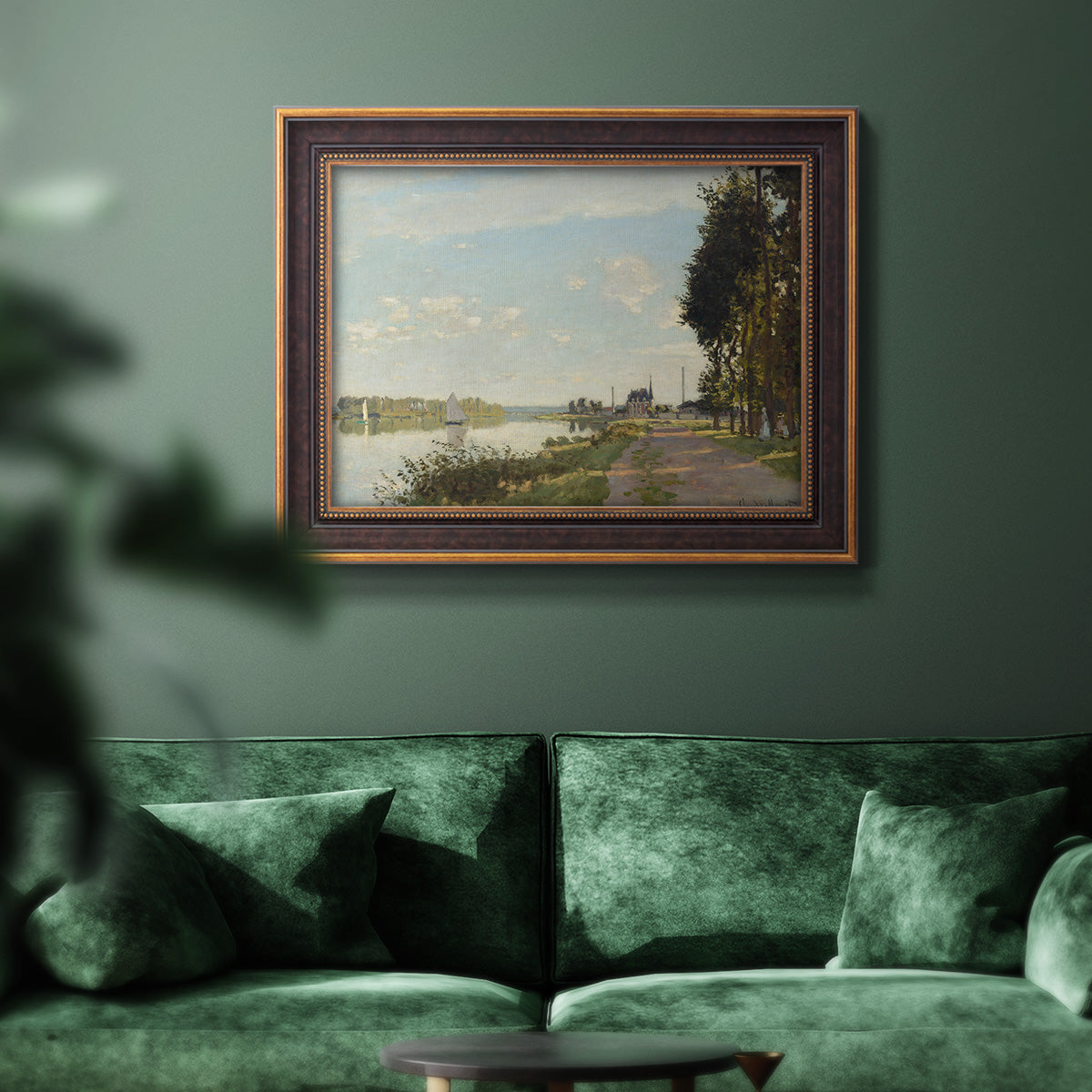 Impressionist river scene with red boats by Claude Monet in an ornate bronzed mahogany wood frame displayed in a dark-toned interior setting.