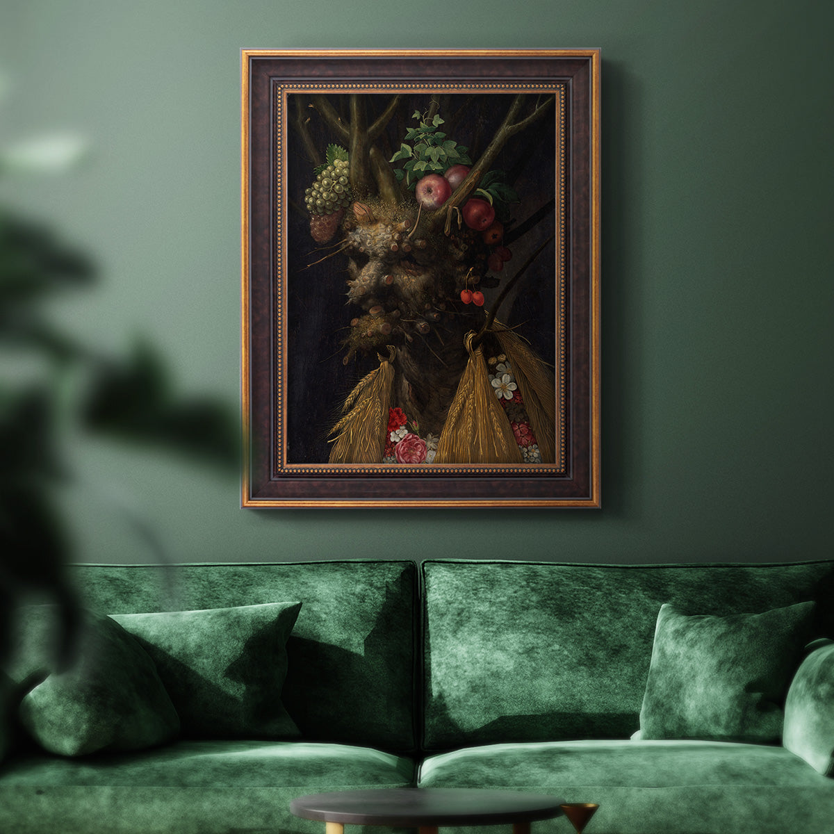 Surreal allegorical portrait representing the four seasons by Giuseppe Arcimboldo in an ornate bronzed mahogany wood frame displayed in a dark-toned interior setting.
