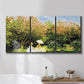Three-panel canvas wall art featuring lush garden landscape with trees, displayed in a bathroom above a bathtub.