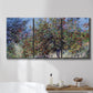 Three-panel canvas wall art featuring orchard of trees in spring bloom, displayed in a bathroom above a bathtub.