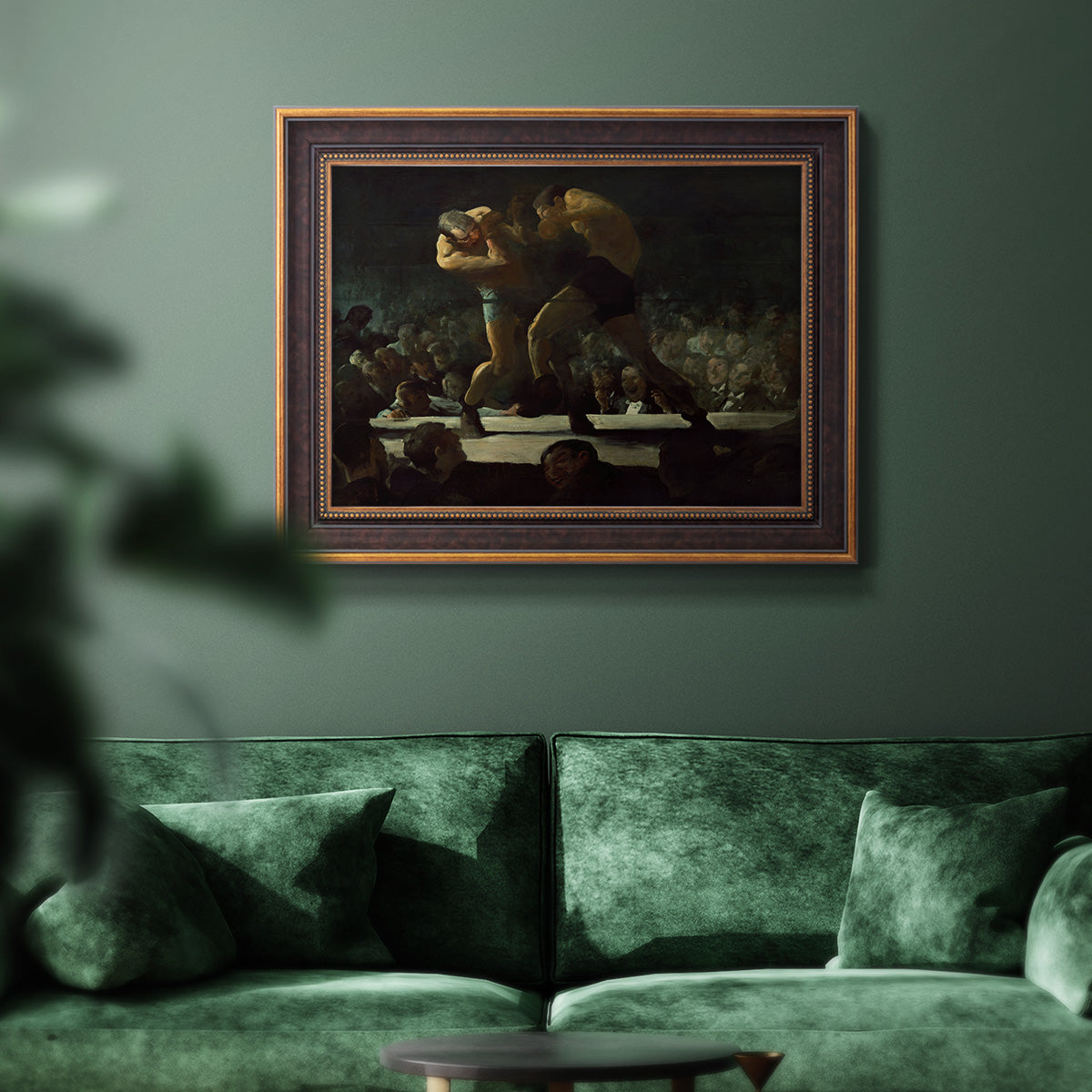 American social club scene painting by George Bellows in an ornate bronzed mahogany wood frame displayed in a dark-toned interior setting.