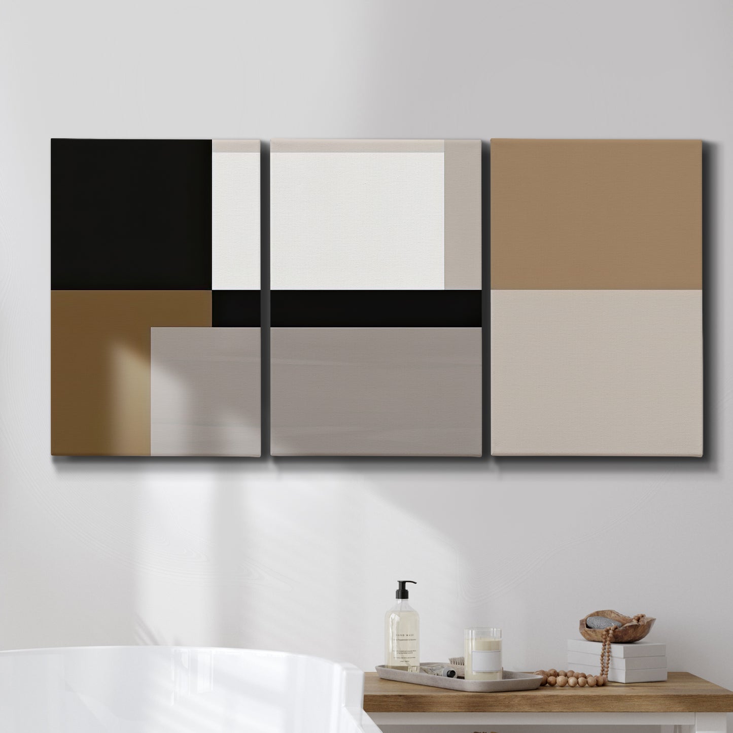 Three-panel canvas wall art featuring geometric abstract centerpoint composition, displayed in a bathroom above a bathtub.
