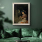 Classical interior scene of a woman weaving flowers by Godfried Schalcken in an ornate champagne frame displayed in a dark-toned interior setting.