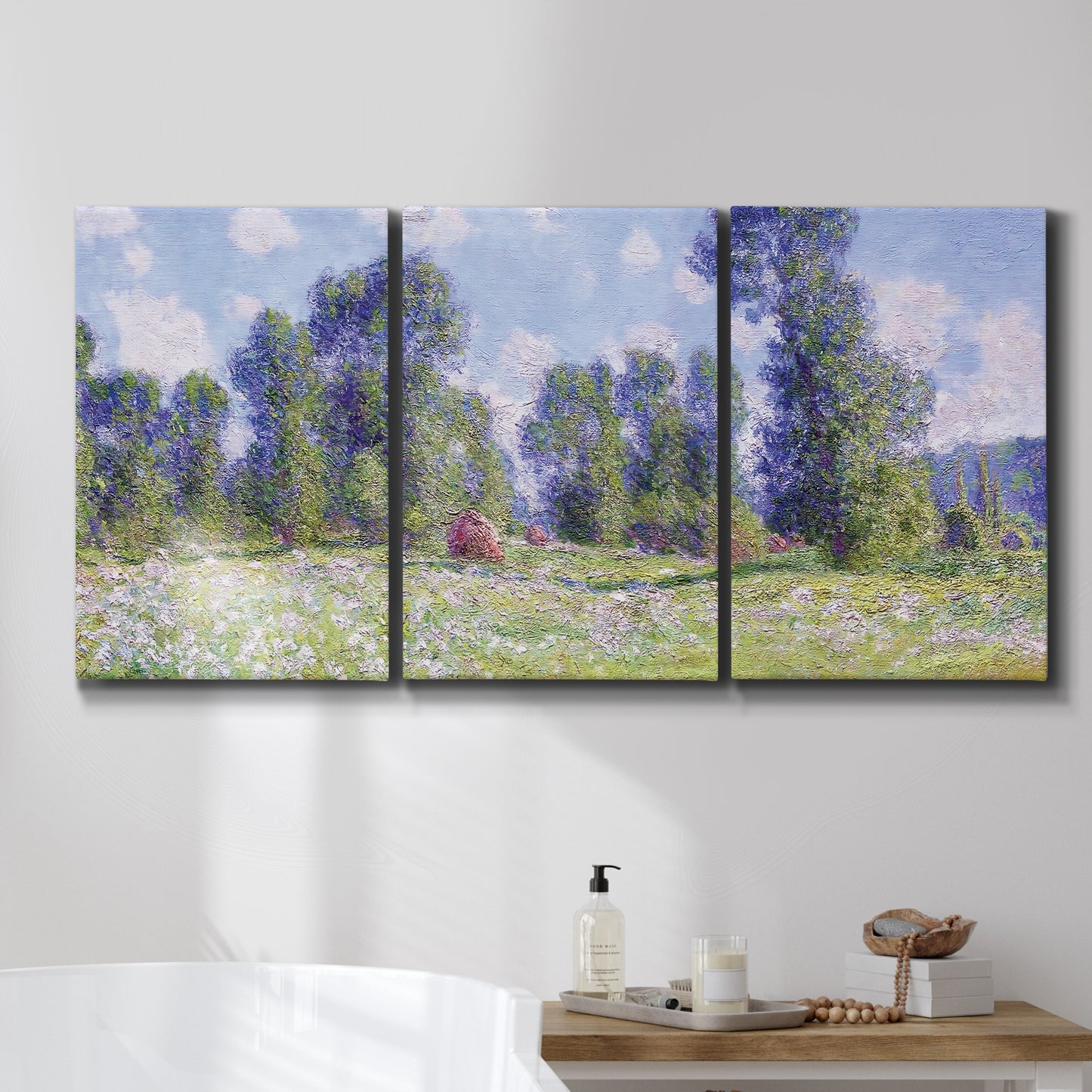 Three-panel canvas wall art featuring poppy field near garden village, displayed in a bathroom above a bathtub.