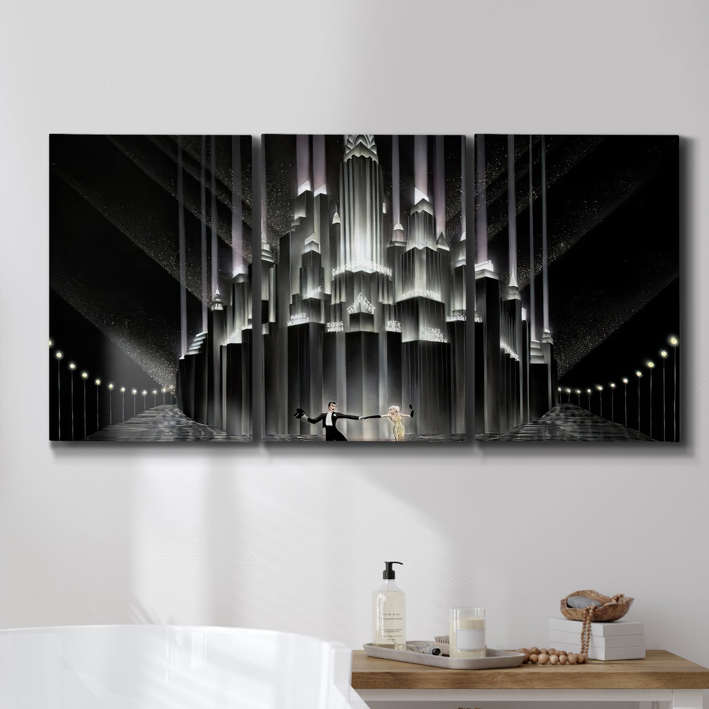 Three-panel canvas wall art featuring vintage city scene with figures, displayed in a bathroom above a bathtub.