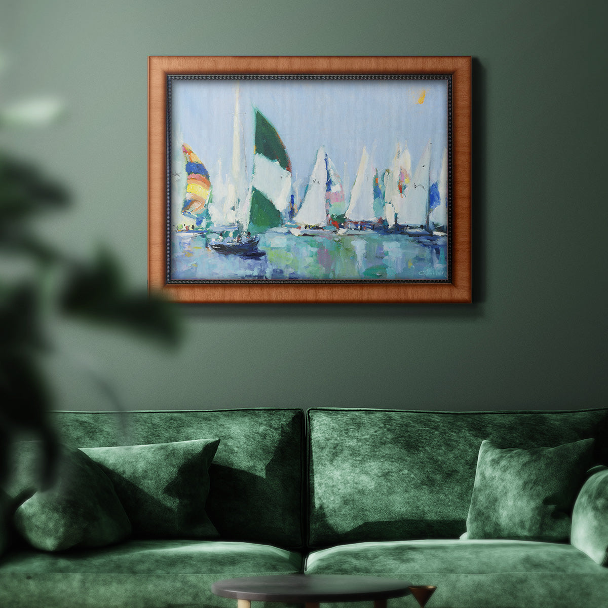Coastal harbor watercolor painting in an ornate vintage burl wood frame displayed in a dark-toned interior setting.
