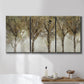 Three-panel canvas wall art featuring sunlight filtering through trees, displayed in a bathroom above a bathtub.