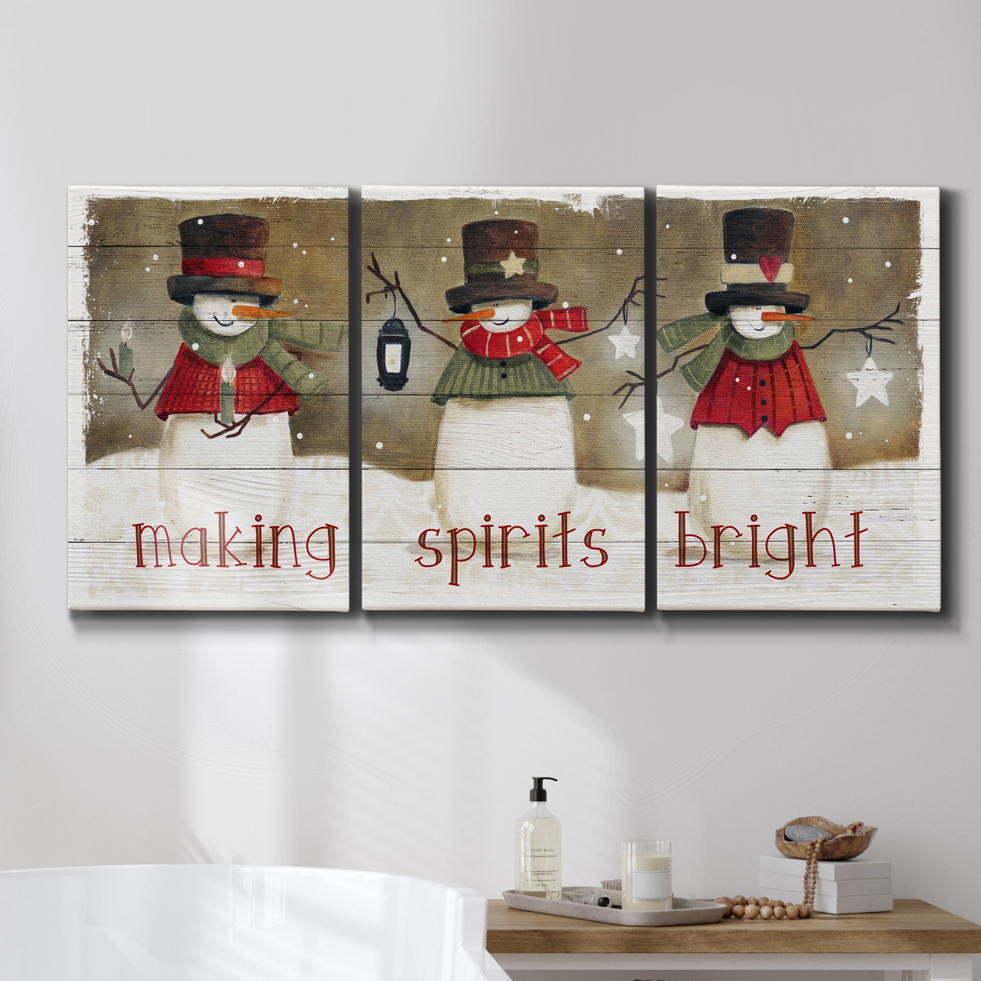 Three-panel canvas wall art featuring misty harbor sunrise with boats, displayed in a bathroom above a bathtub.