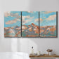Three-panel canvas wall art featuring soft pastel western hills landscape, displayed in a bathroom above a bathtub.