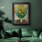 Impressionist floral painting of artichoke flowers by Claude Monet in an ornate black frame with gilded inner detail displayed in a dark-toned interior setting.
