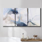 Three-panel canvas wall art featuring airy abstract movement composition, displayed in a bathroom above a bathtub.