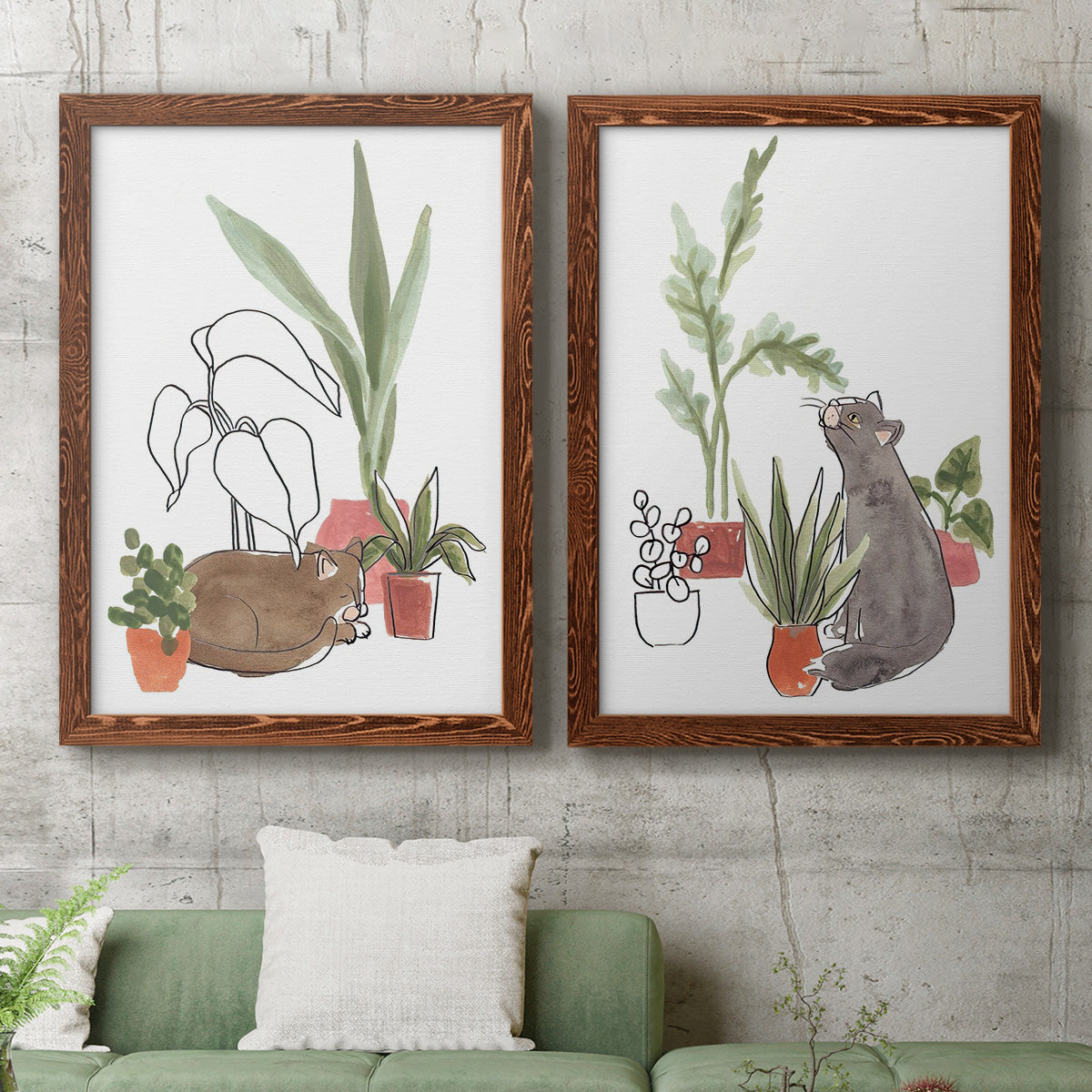 Set of two maple barnwood framed canvas prints depicting a coordinated art pair of cats tucked among collections of potted houseplants rendered as whimsical botanical animal illustrations above a sofa in a modern living room.