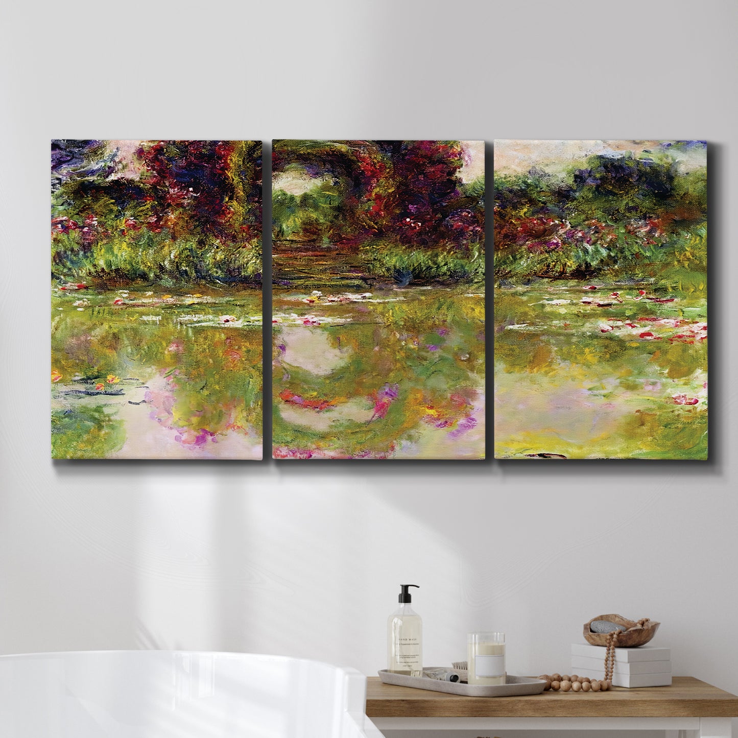 Three-panel canvas wall art featuring arched rose garden walkway, displayed in a bathroom above a bathtub.