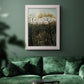 Dreamlike forest landscape scene by Henri Rousseau in an ornate weathered white frame displayed in a dark-toned interior setting.