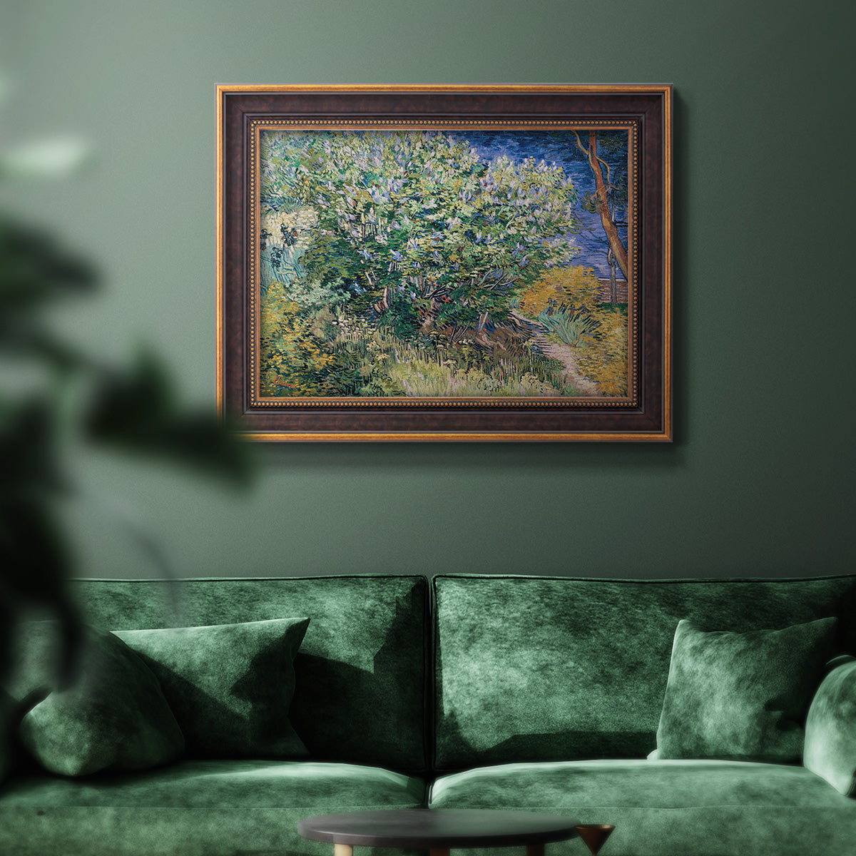 Impressionist lilac flower painting by Vincent van Gogh in an ornate bronzed mahogany wood frame displayed in a dark-toned interior setting.