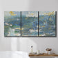 Three-panel canvas wall art featuring sparkling abstract sea surface, displayed in a bathroom above a bathtub.