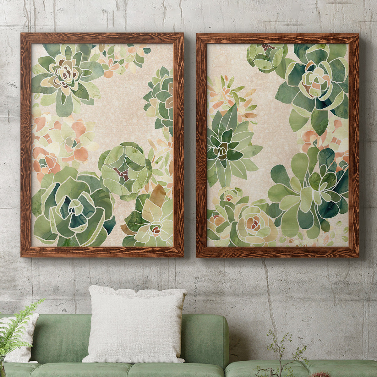 Set of two maple barnwood framed canvas prints depicting a coordinated art pair of dense repeating succulents and small flowers rendered as decorative botanical pattern prints above a sofa in a modern living room.