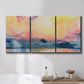 Three-panel canvas wall art featuring prismatic watercolor coastal seascape, displayed in a bathroom above a bathtub.