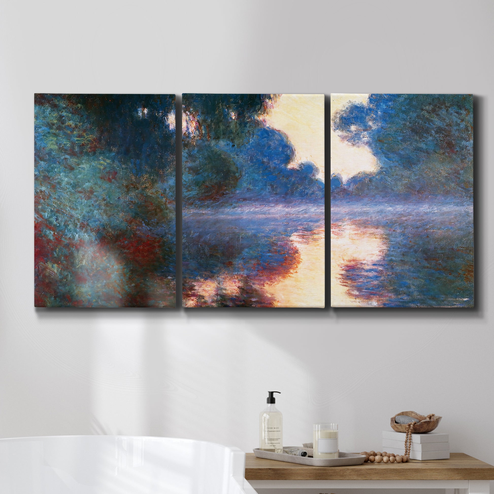 Three-panel canvas wall art featuring misty river surface at dawn, displayed in a bathroom above a bathtub.