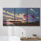 Three-panel canvas wall art featuring farmhouse scene before approaching storm, displayed in a bathroom above a bathtub.