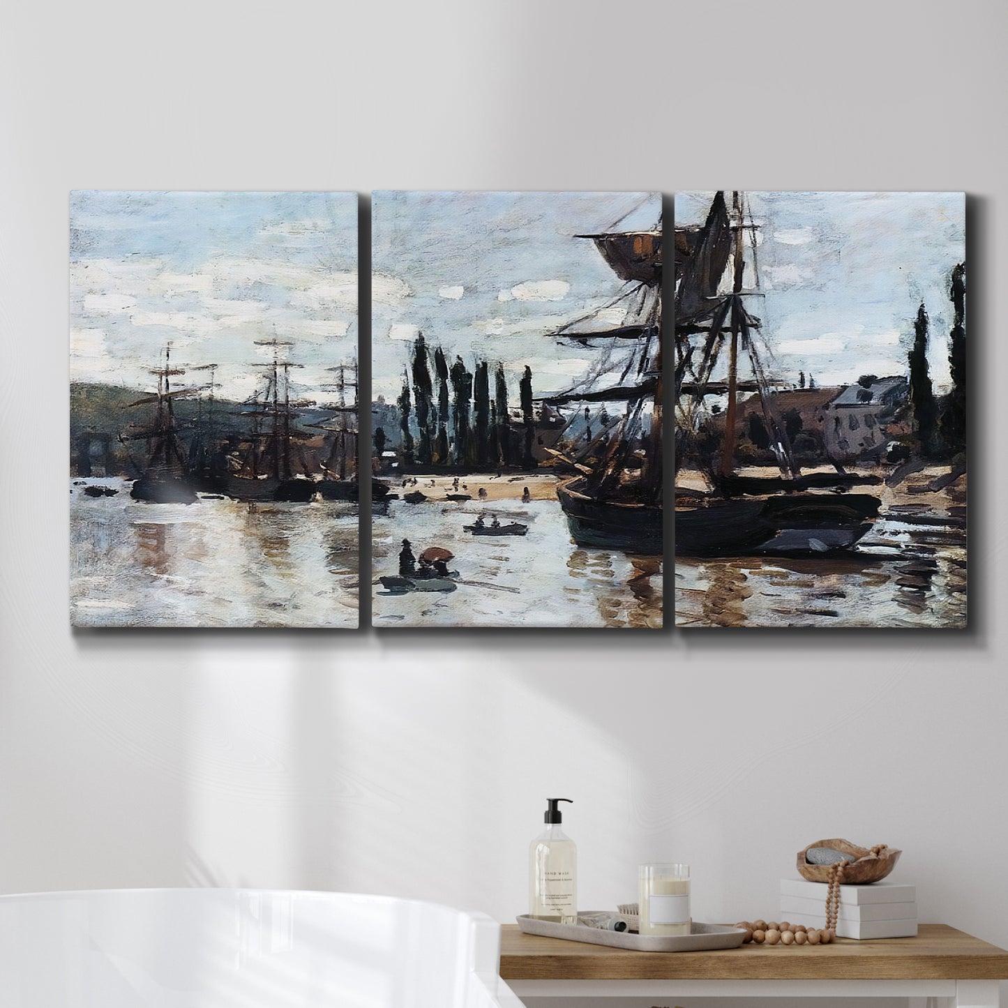 Three-panel canvas wall art featuring harbor scene with boats and quays, displayed in a bathroom above a bathtub.