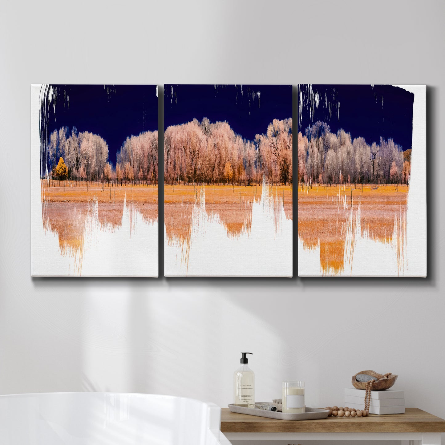 Three-panel canvas wall art featuring panoramic treeline landscape photograph, displayed in a bathroom above a bathtub.