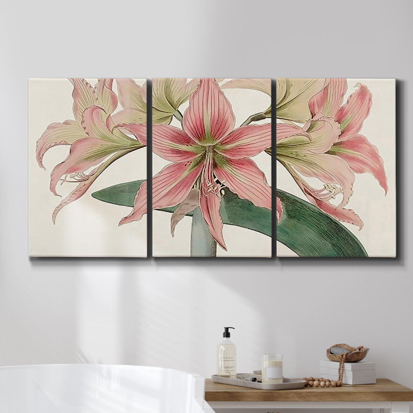 Three-panel canvas wall art featuring vintage styled amaryllis floral study, displayed in a bathroom above a bathtub.