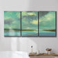 Three-panel canvas wall art featuring still lagoon water beneath open sky, displayed in a bathroom above a bathtub.