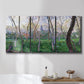 Three-panel canvas wall art featuring spring landscape along river, displayed in a bathroom above a bathtub.