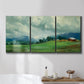 Three-panel canvas wall art featuring wide pastoral valley landscape, displayed in a bathroom above a bathtub.