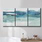 Three-panel canvas wall art featuring minimalist ultramarine abstract vista, displayed in a bathroom above a bathtub.
