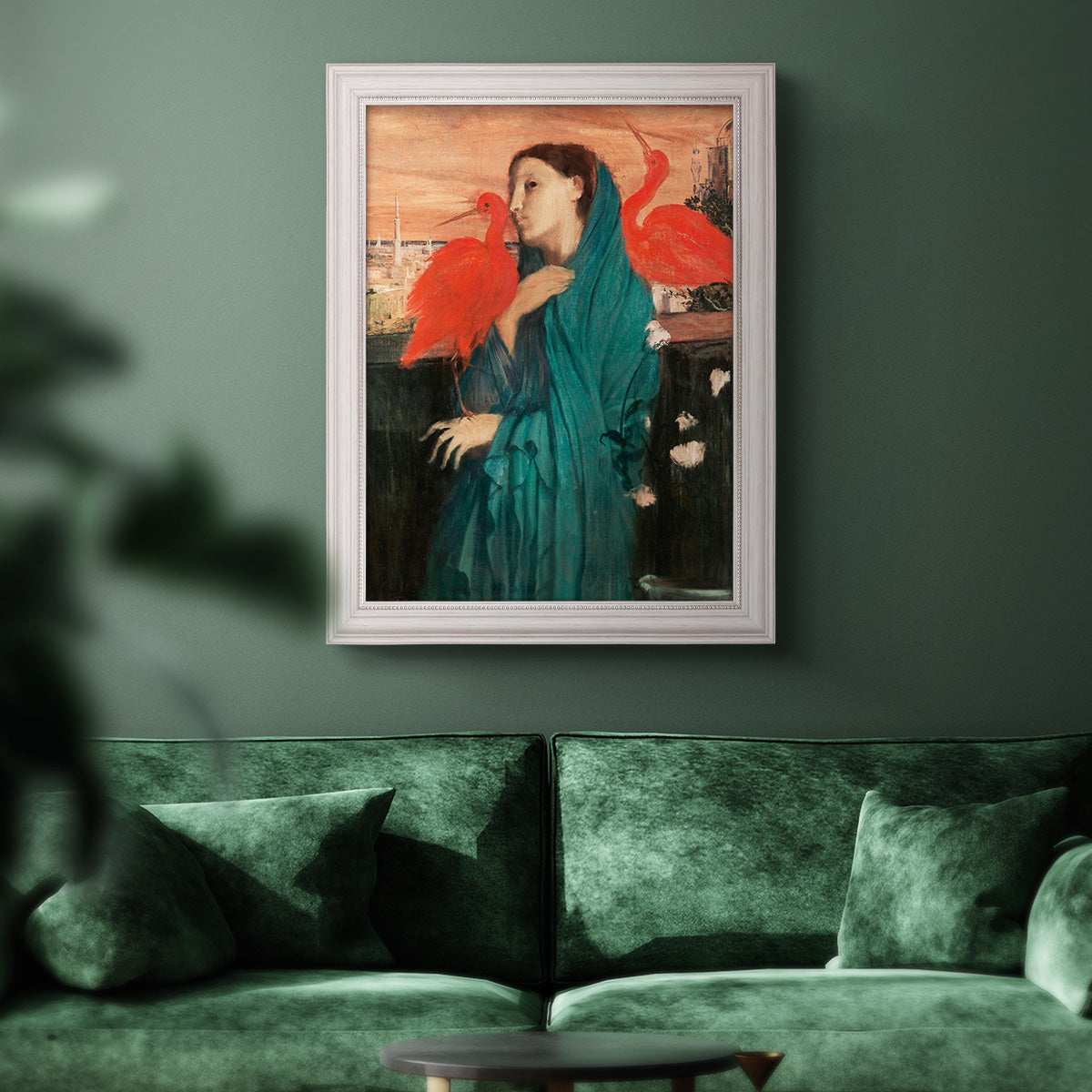 Impressionist portrait of a young woman with an ibis by Edgar Degas in an ornate weathered white frame displayed in a dark-toned interior setting.