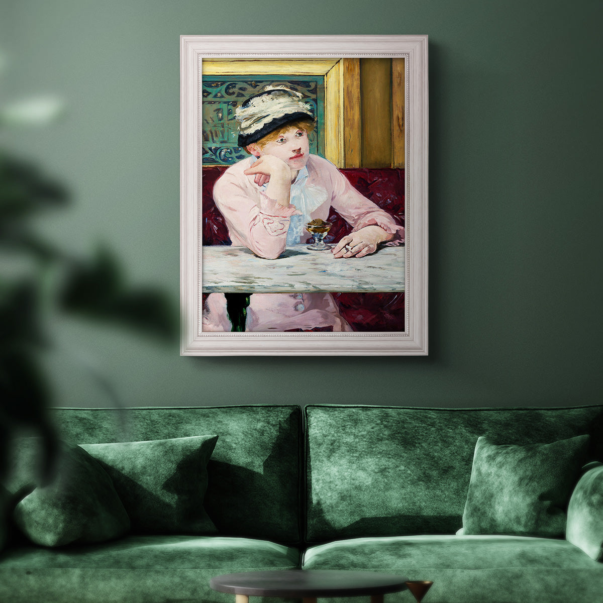 Impressionist portrait scene with plum brandy by Édouard Manet in an ornate weathered white frame displayed in a dark-toned interior setting.