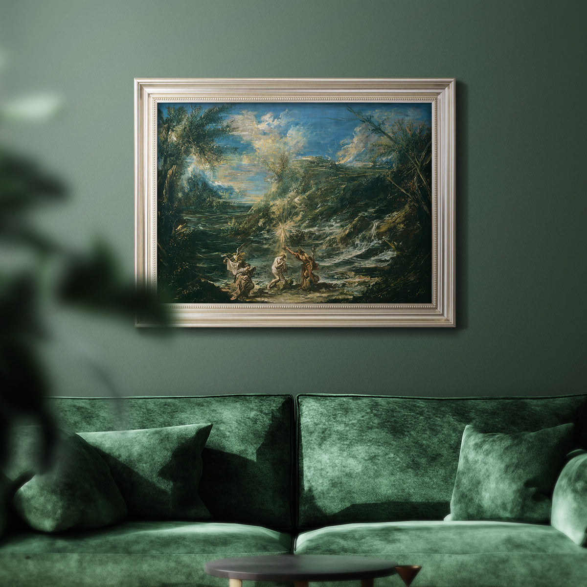 Religious landscape depicting the baptism of Christ by Alessandro Magnasco in an ornate champagne frame displayed in a dark-toned interior setting.