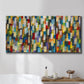 Three-panel canvas wall art featuring colorful confetti style abstraction, displayed in a bathroom above a bathtub.
