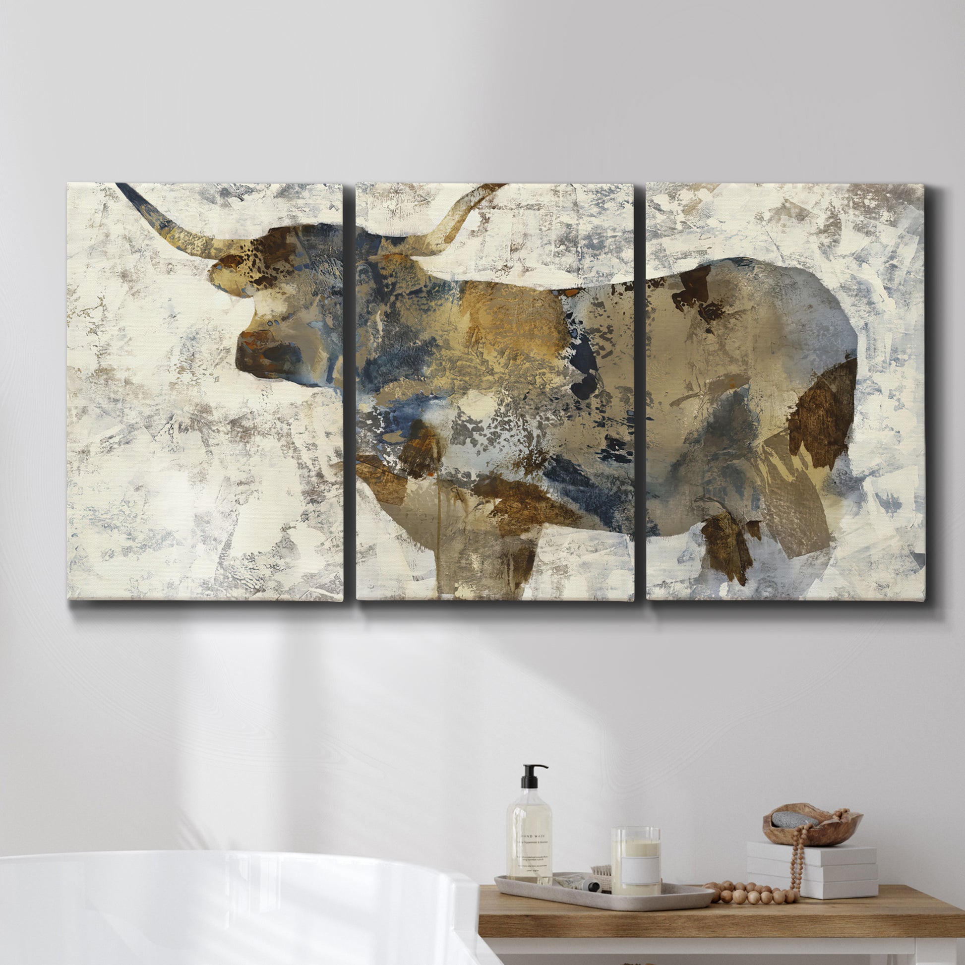 Three-panel canvas wall art featuring farm animal portrait in rustic setting, displayed in a bathroom above a bathtub.
