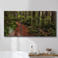 Three-panel canvas wall art featuring forest trail landscape photograph, displayed in a bathroom above a bathtub.