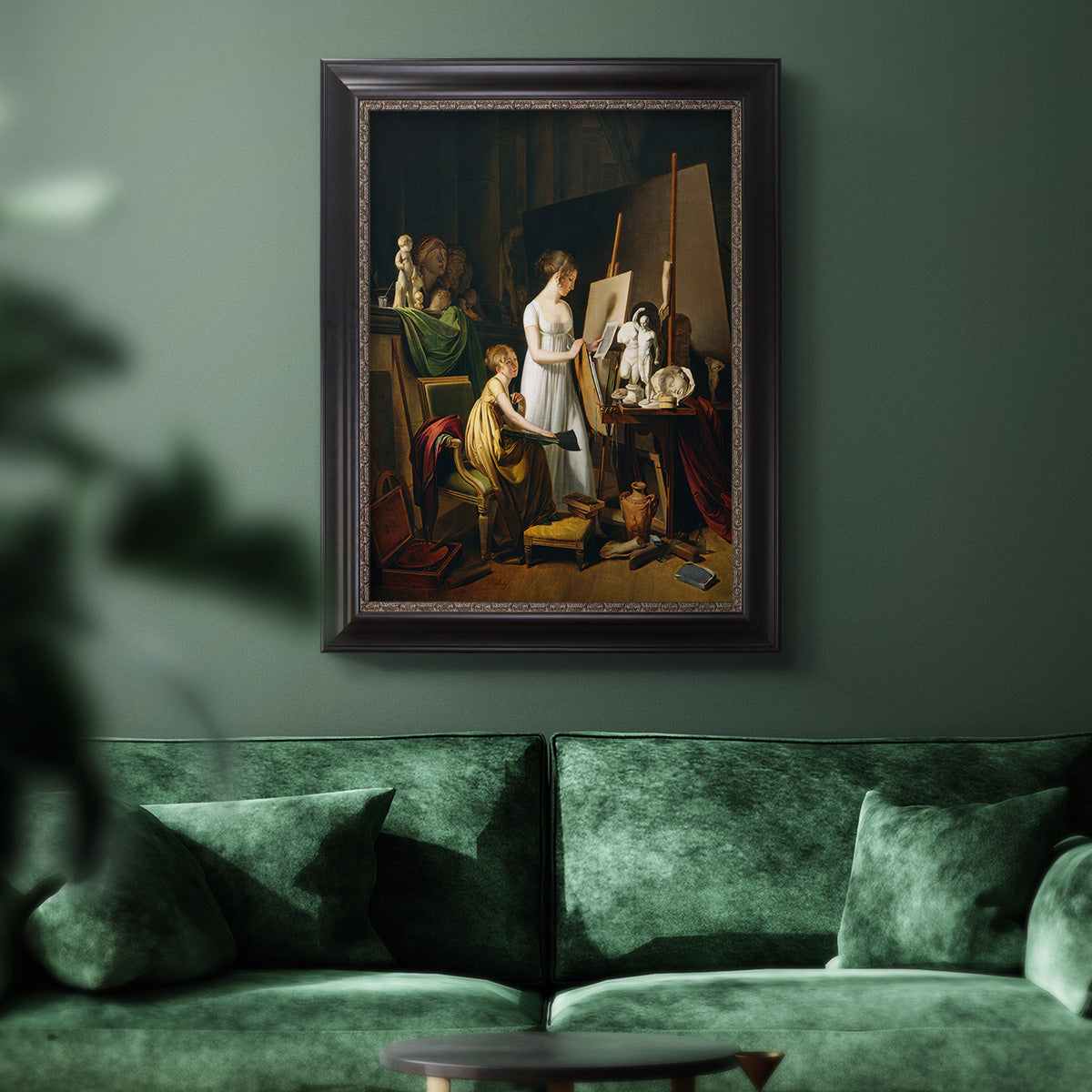 Classical interior painting of an artist at work by Louis-Leopold Boilly in an ornate black frame with gilded inner detail displayed in a dark-toned interior setting.