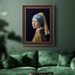 Iconic portrait of a girl wearing a pearl earring by Johannes Vermeer in an ornate bronzed mahogany wood frame displayed in a dark-toned interior setting.