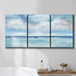Three-panel canvas wall art featuring tropical clouds over ocean horizon, displayed in a bathroom above a bathtub.