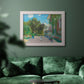 Impressionist residential landscape at Argenteuil by Claude Monet in an ornate weathered white frame displayed in a dark-toned interior setting.