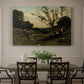 Canvas art print featuring an early morning landscape with trees and soft light over countryside, showcased as a statement wall artwork