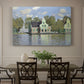 Canvas art print featuring a row of houses along river with reflections in calm water, showcased as a statement wall artwork