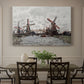 Canvas art print featuring windmills standing beside water under open sky in rural landscape, showcased as a statement wall artwork