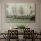 Canvas art print featuring women washing clothes beside water under willow trees, showcased as a statement wall artwork